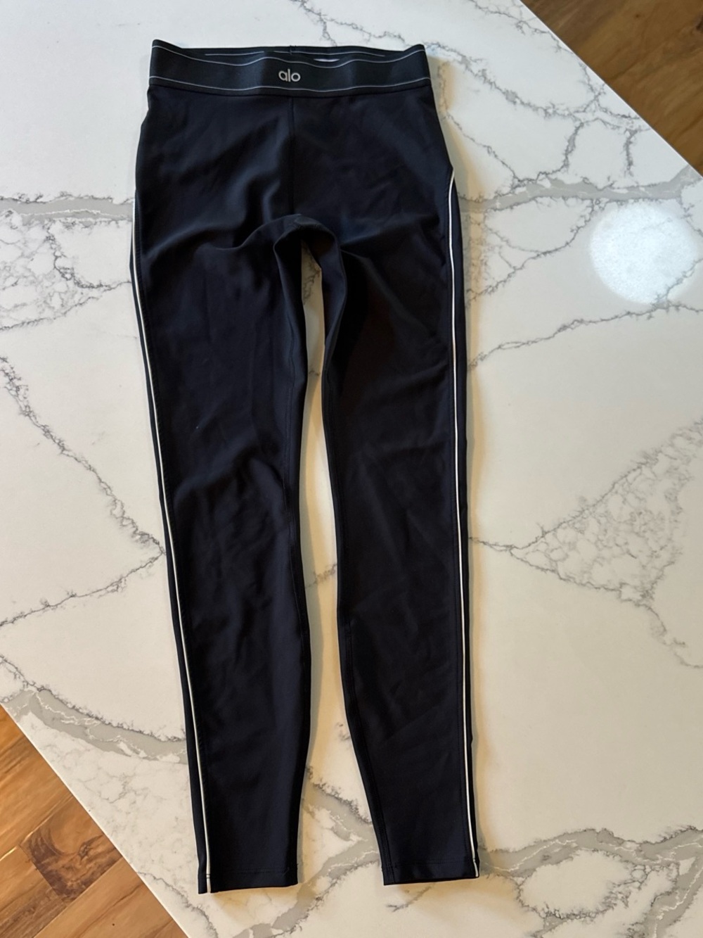 Alo Yoga black leggings with white side stripes size M